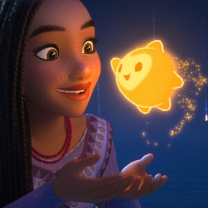 GLOW UP – In Walt Disney Animation Studios’ “Wish,” sharp-witted idealist Asha (voice of Ariana DeBose) makes a wish so powerful, it’s answered by a cosmic force—a little ball of boundless energy called Star. Artists lit the character in a way that makes it luminous—casting a glow onto the surrounding characters and environment. The epic animated musical opens only in theaters on Nov. 22, 2023. © 2023 Disney. All Rights Reserved.